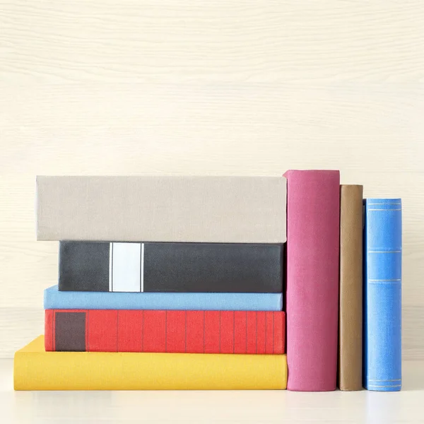 Stack of books in the bookself — Stock Photo, Image