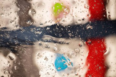 Yakın görüş kahverengi, siyah, yeşil, kırmızı renkli soyut tasarım, doku. Güzel arka planlar.