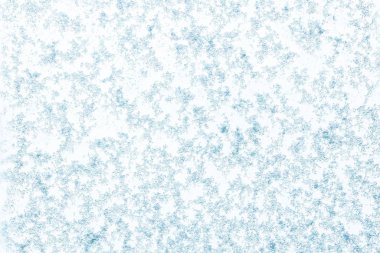 Açık mavi arkaplandaki doğal kar deseninin güzel yakın görüntüsü. Güzel arkaplan dokusu. 
