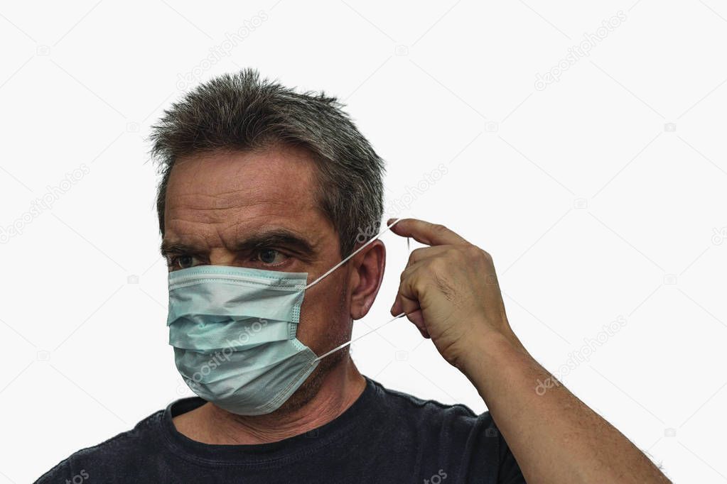 Close up view of man in white face mask. Influenza virus concept. 