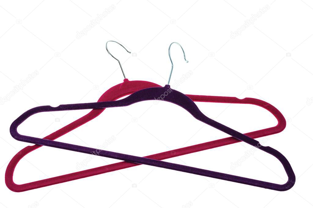 Close up view of colorful hangers isolated on white background. 