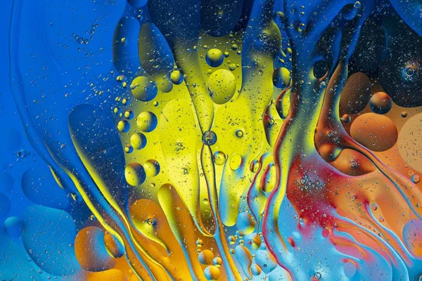 Close up view of red, blue, orange, yellow colorful abstract design, texture. Beautiful backgrounds.