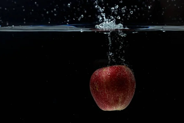 Close View Colorful Apple Falling Water Black Background Gorgeous Backgrounds — Stock Photo, Image