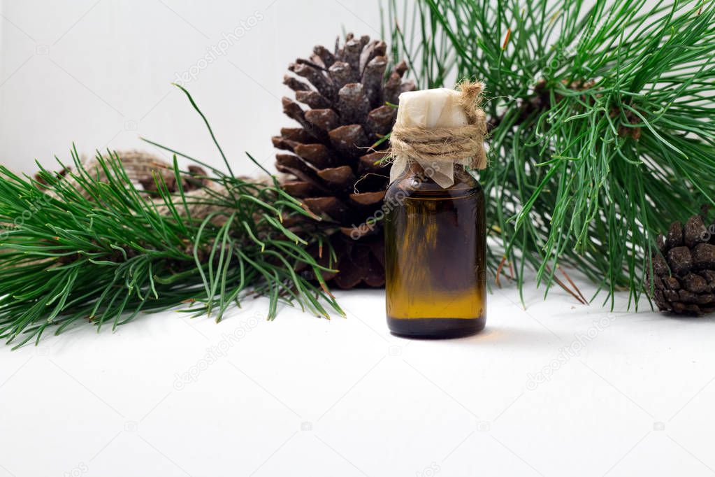 Oil of pine nuts. Cedar oil on a wooden background. Useful oil with vitamins..