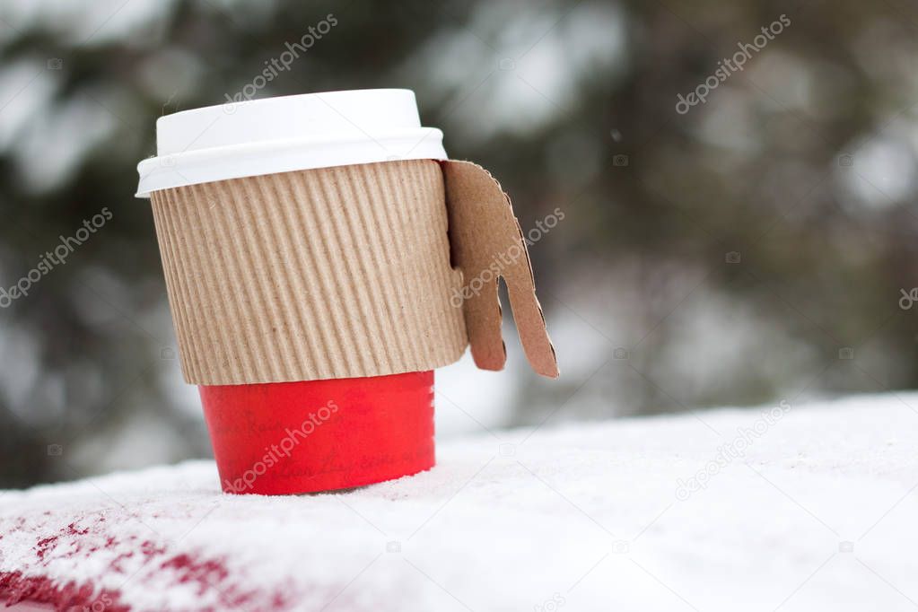 Coffee in papper cup with snow winter and holiday