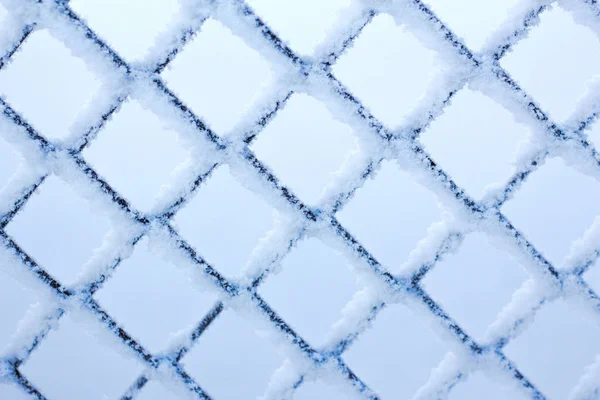 Celosía de invierno en la textura de escarcha rombo de metal —  Fotos de Stock