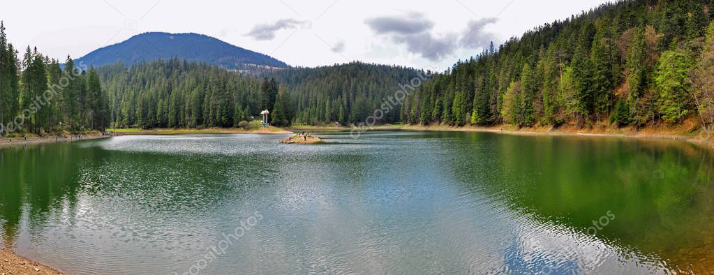 artistic panorama of a mountain lake