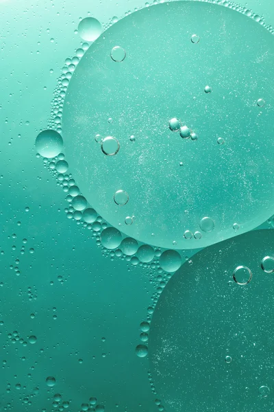 Grön abstrakt av olja droplet. — Stockfoto