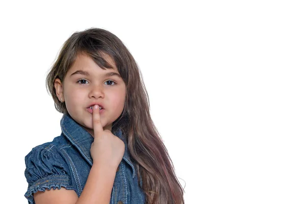 Portrait of little girl gesturing shush isolated — Stock Photo, Image