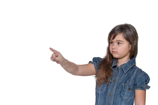 Little girl is showing her index finger into space — Stock Photo, Image