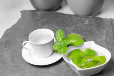 Color Splash Effect of cup of Silver Spurflower tea  clipart