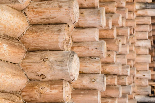 Construction of wood logs. A lot of Wood logs texture background closeup