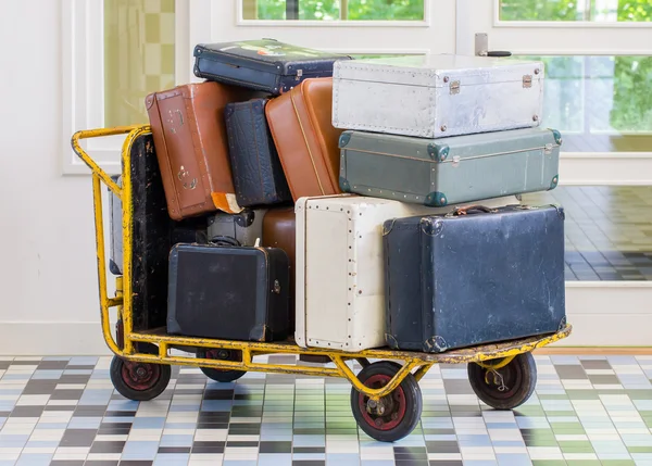 Trolley full of old luggage — Stock Photo, Image