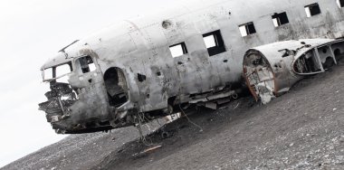 The abandoned wreck of a US military plane on Southern Iceland clipart