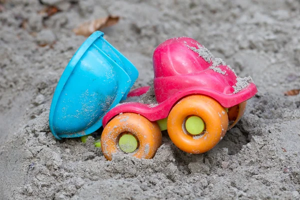 Máquina infantil na areia — Fotografia de Stock