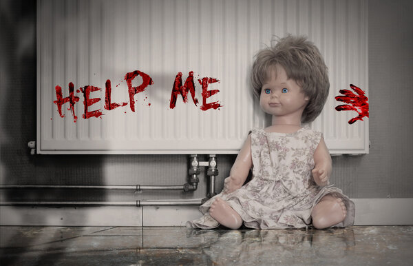 Abandoned doll on floor