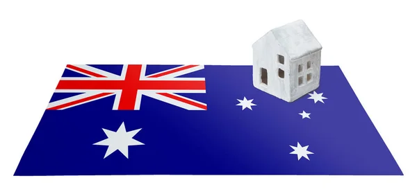 Bir bayrak - Avustralya üzerinde küçük ev — Stok fotoğraf