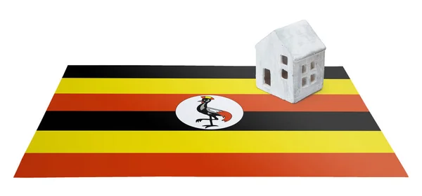 Pequena casa em uma bandeira - Uganda — Fotografia de Stock