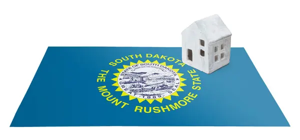 Small house on a flag - South Dakota — Stock Photo, Image