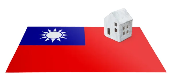 Pequeña casa en una bandera - Taiwán — Foto de Stock