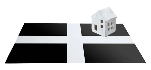 Small house on a flag - Cornwall — Stock Photo, Image