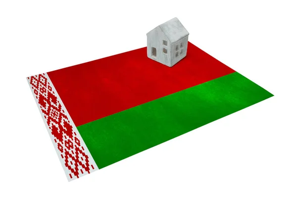 Small house on a flag - Belarus — Stock Photo, Image