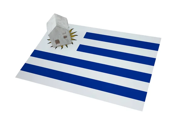 Litet hus på en flagga - Uruguay — Stockfoto