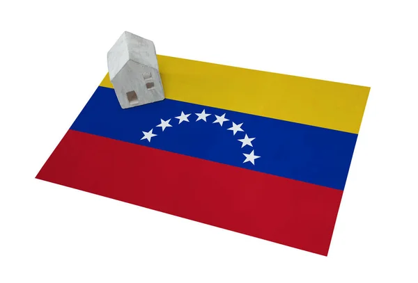 Pequena casa em uma bandeira - Venezuela — Fotografia de Stock