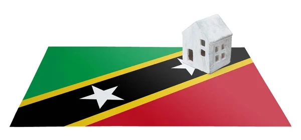Маленький дом на флаге - Сент-Китс и Невис — стоковое фото