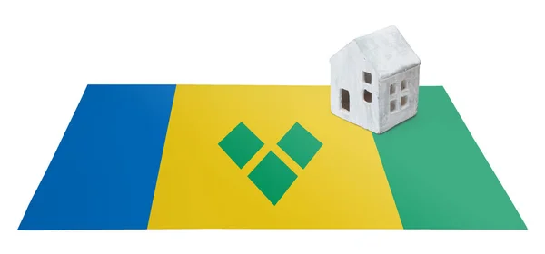 Маленький дом на флаге - Сент-Винсент — стоковое фото