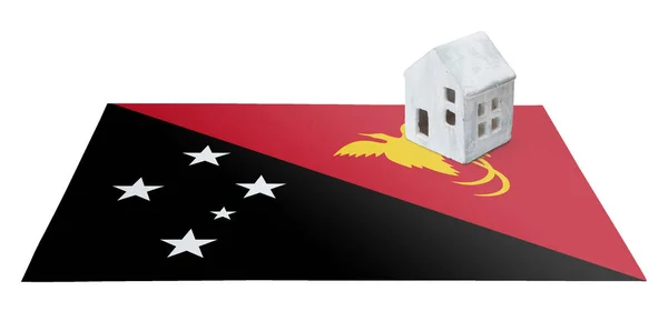 Huisje op een vlag - Papoea-Nieuw-Guinea — Stockfoto