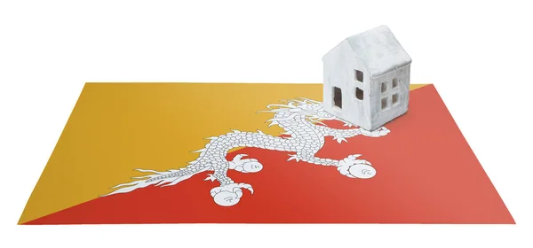 Pequena casa em uma bandeira - Butão — Fotografia de Stock