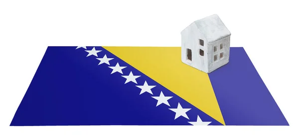 Kleines Haus auf einer Fahne - Bosnien-Herzegowina — Stockfoto