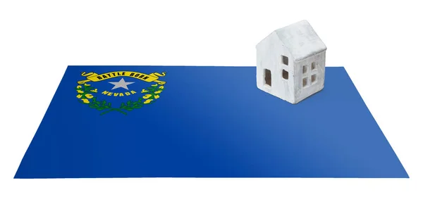 Piccola casa su una bandiera - Nevada — Foto Stock