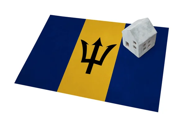 Kleines Haus auf einer Flagge - Barbados — Stockfoto
