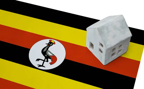 Häuschen auf einer Fahne - uganda — Stockfoto