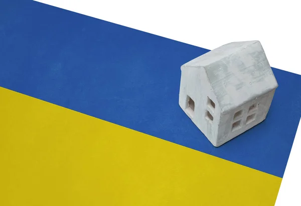 Petite maison sur un drapeau - Ukraine — Photo