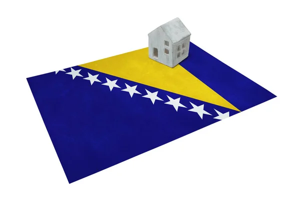 Petite maison sur un drapeau - Bosnie Herzégovine — Photo