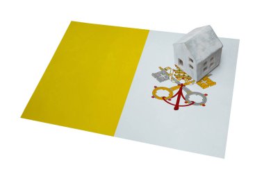 Bir bayrak - Vatikan üzerinde küçük ev