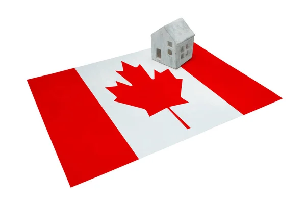 Huisje op een vlag - Canada — Stockfoto