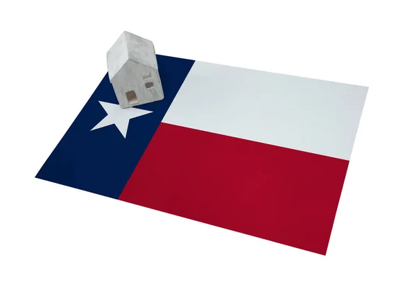 Bir bayrak - Texas üzerinde küçük ev — Stok fotoğraf