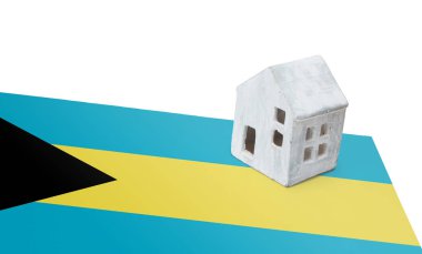 Bir bayrak - Bahama Adaları üzerinde küçük ev