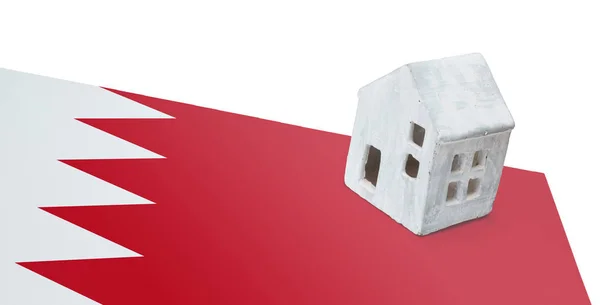 Small house on a flag - Bahrain — Stock Photo, Image