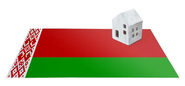 Piccola casa su una bandiera - Belarus — Foto Stock