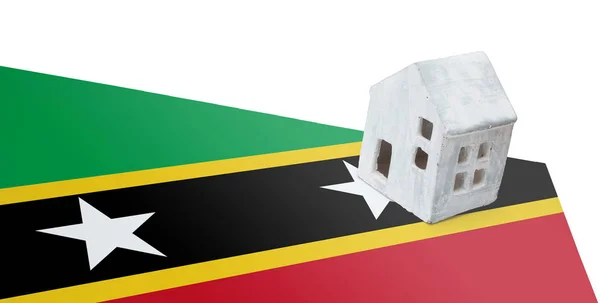 Small house on a flag - Saint Kitts and Nevis — Stock Photo, Image