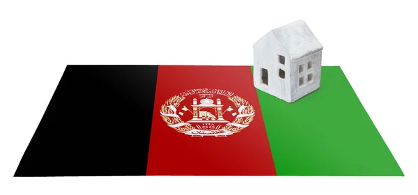 Piccola casa su una bandiera - Afghanistan — Foto Stock