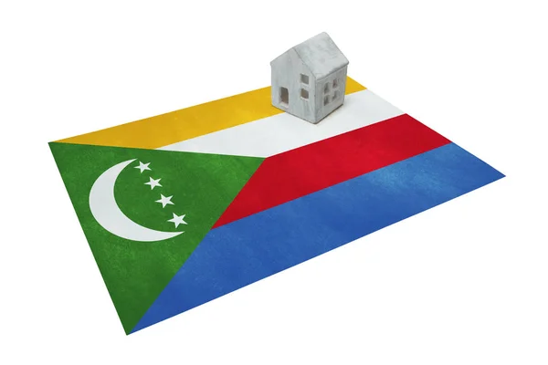 Kleines Haus auf einer Fahne - Komoren — Stockfoto