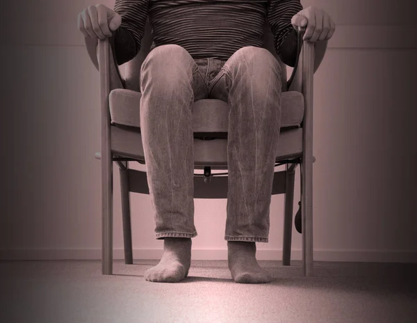 Man in armchair, slightly creepy — Stock Photo, Image