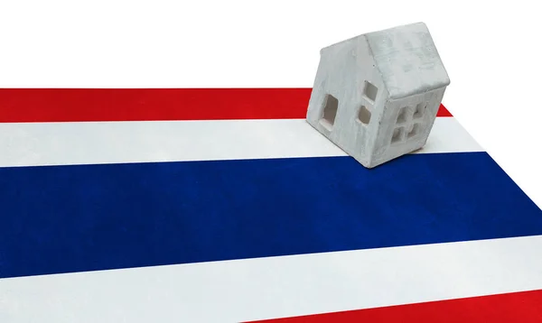 Small house on a flag - Thailand — Stock Photo, Image