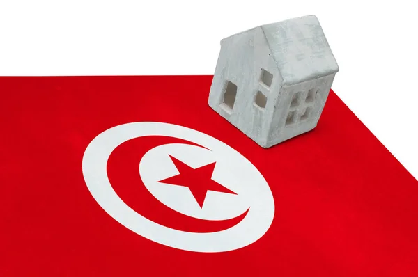 Litet hus på en flagga - Tunisien — Stockfoto